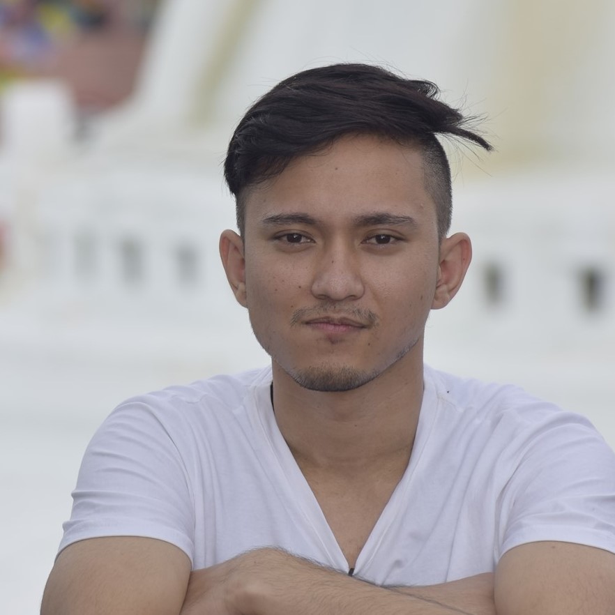 Wilson Shrestha from nepal in white cloth t-shirt on bouddha