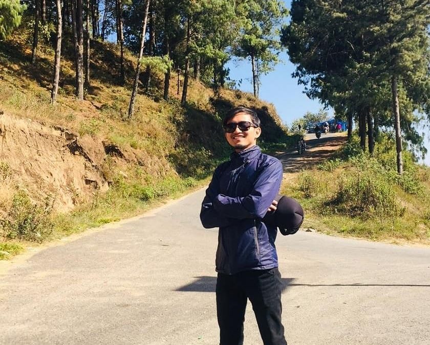 Nepali Boy Wilson Shrestha wearing sunglass and blue jacket, on the way to nagarkot bhaktapur